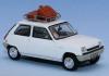 SAI 1739 - Renault 5 TL, white, car roof rack with 2 luggages, 1 driver and 1 passenger