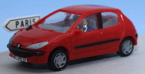 SAI 1632 - Peugeot 206 5 portes rouge Aden, avec conducteur