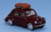 SAI 1730 - Renault 4cv rouge pourpre, galerie de toit, 2 valises, un conducteur et un passager