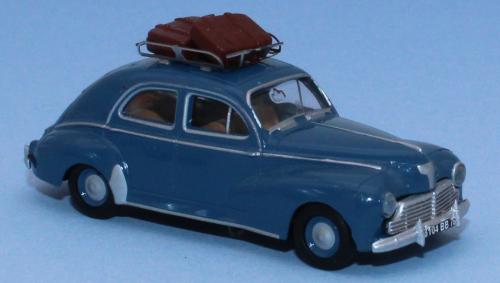 SAI 1720 - Peugeot 203 bleu azur, galerie de toit et 2 valises