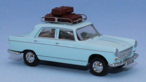 SAI 1822 - Peugeot 404 bleu pastel, galerie de toit et 3 valises