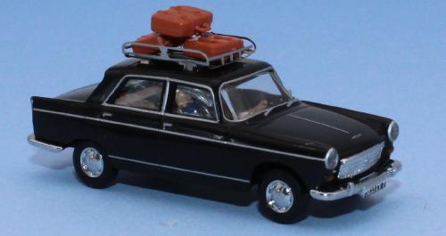 SAI 1823 - Peugeot 404 noire, galerie de toit, 3 valises, un conducteur et un passager